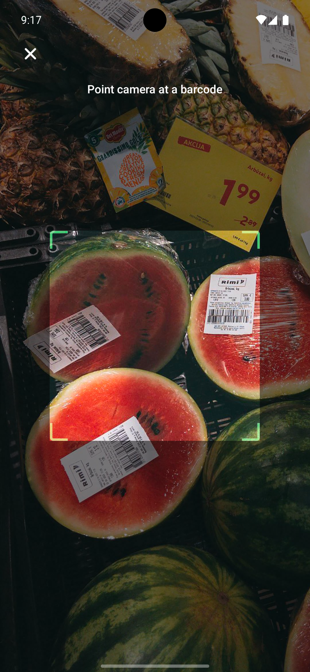 Scanning a product barcode with the EiyoHub camera.